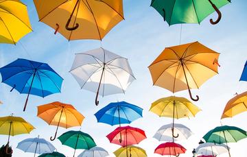 colourful umbrellas in the sky